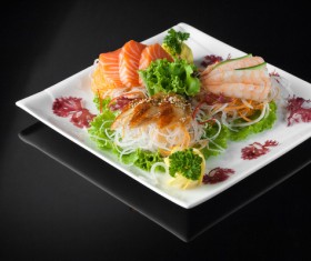 Sushi in a plate on a black background Stock Photo 03