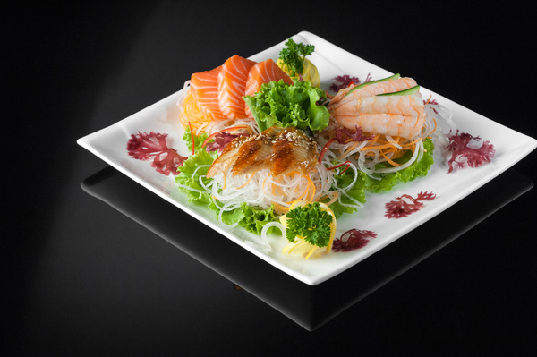 Sushi in a plate on a black background Stock Photo 03