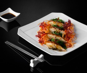 Sushi in a plate on a black background Stock Photo 04