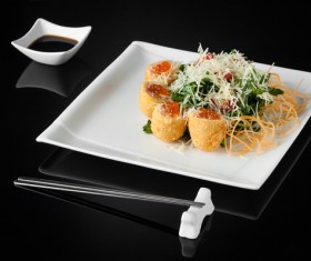 Sushi in a plate on a black background Stock Photo 05