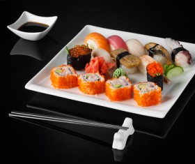 Sushi in a plate on a black background Stock Photo 06
