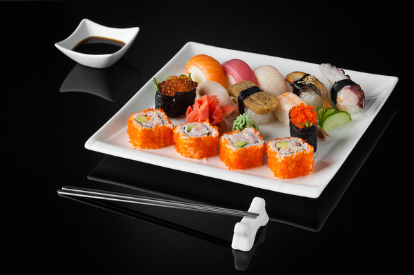 Sushi in a plate on a black background Stock Photo 06