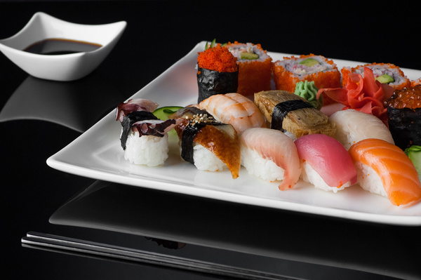 Sushi in a plate on a black background Stock Photo 07