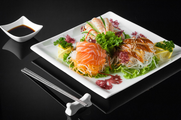 Sushi in a plate on a black background Stock Photo 09