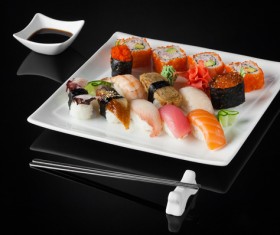 Sushi in a plate on a black background Stock Photo 12