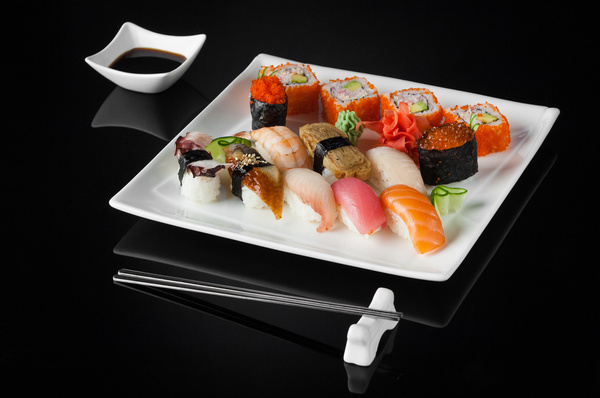 Sushi in a plate on a black background Stock Photo 12