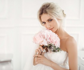 The beautiful bride holds the bouquet Stock Photo 01