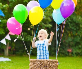 The cute kids in the basket Stock Photo