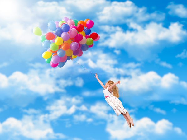 The little girl holding balloons fly HD picture