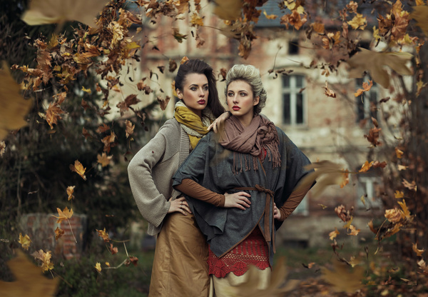 The two beautiful women in the leaves Stock Photo