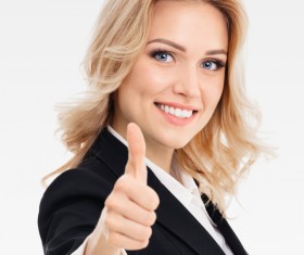 Thumbs up woman Stock Photo
