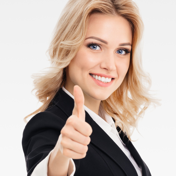 Thumbs up woman Stock Photo