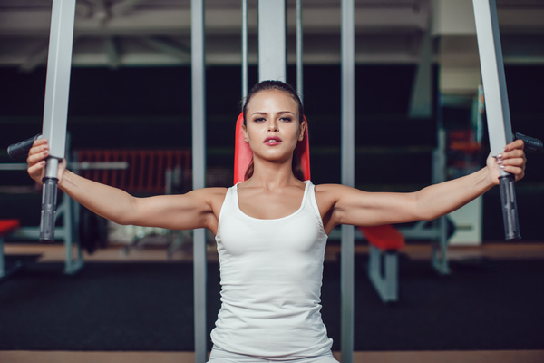 Use of fitness equipment exercise girl Stock Photo 04