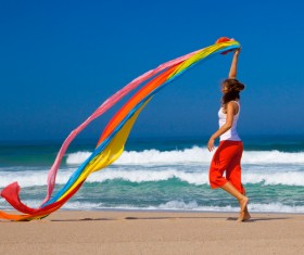 Waving different colors of silk jumping woman HD picture