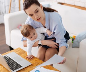 While working while taking care of the childs mother Stock Photo 02