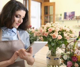 Woman working in florist Stock Photo 06