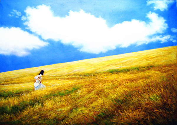 Yellow girl in the wheat field Stock Photo