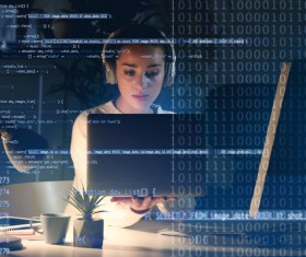 Young beautiful female programmer Stock Photo