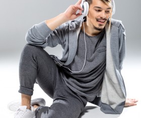 Young people with headphones Stock Photo