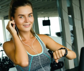 woman listening to music in the gym Stock Photo