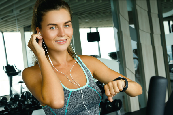 woman listening to music in the gym Stock Photo