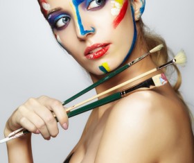 woman with a paint on her face and a brush HD picture 02
