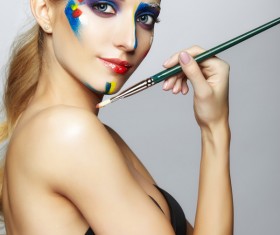 woman with a paint on her face and a brush HD picture 03