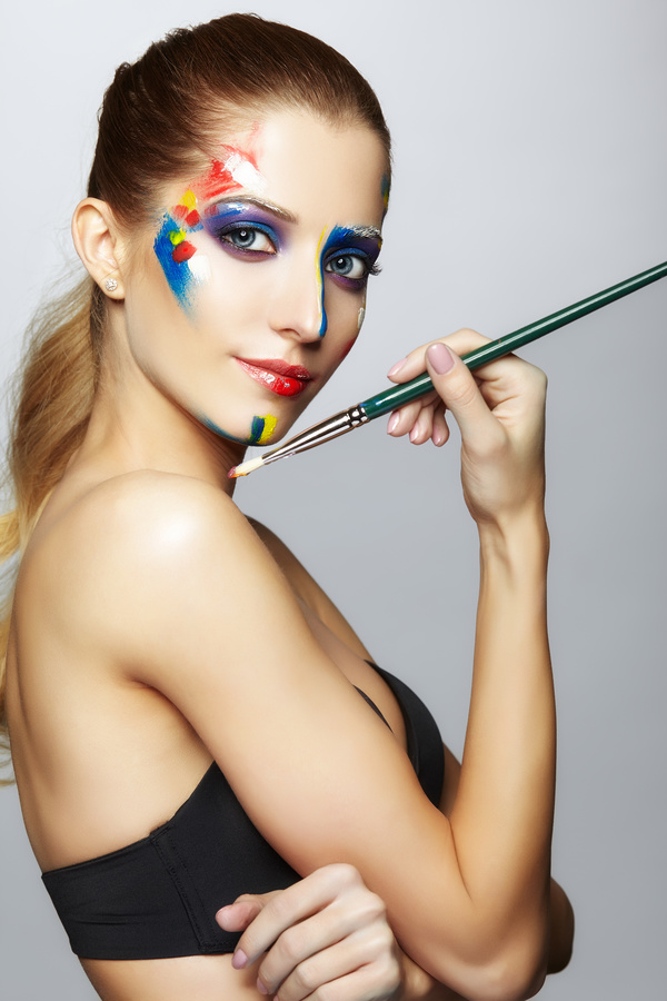 woman with a paint on her face and a brush HD picture 03
