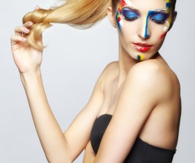 woman with a painted oil on his face HD picture