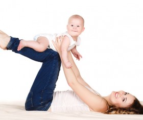 And the baby playing the mother Stock Photo