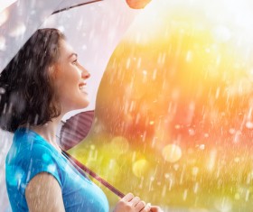 Beautiful woman in the rain Stock Photo