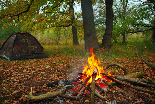 Camping tents and bonfire Stock Photo