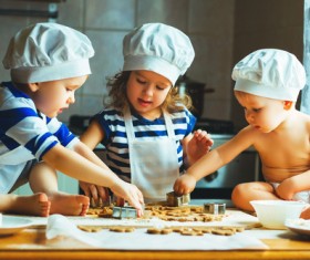 Children making cookies in the kitchen Stock Photo
