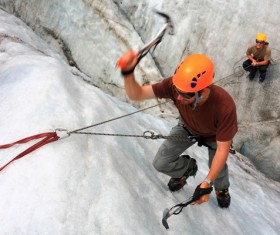 Climb the snow-capped mountains Stock Photo