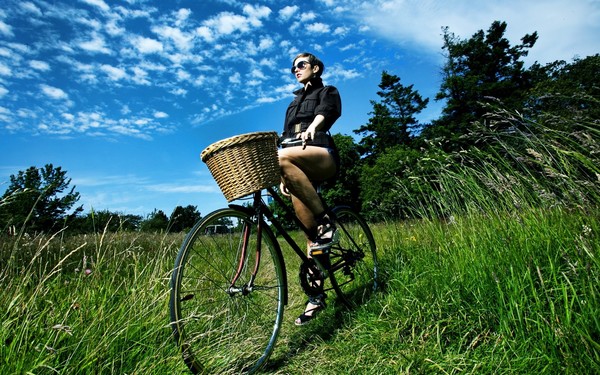 Cycling woman Stock Photo