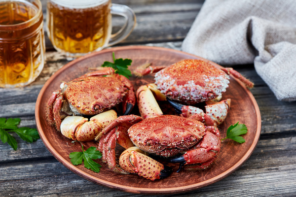 Delicious crab with beer Stock Photo