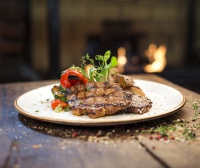 Delicious grilled steak with garnish Stock Photo