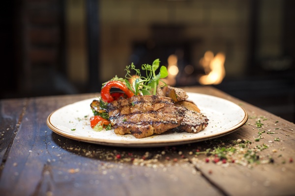 Delicious grilled steak with garnish Stock Photo