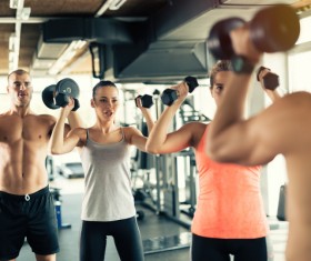 Dumbbell fitness men and women Stock Photo 01