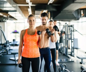 Dumbbell fitness men and women Stock Photo 02
