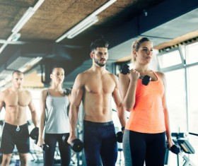 Dumbbell fitness men and women Stock Photo 03