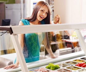 Eat the lady of the buffet Stock Photo