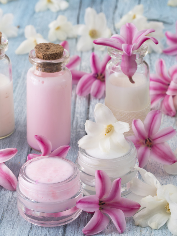 Essential oils and petals on the desktop Stock Photo 02