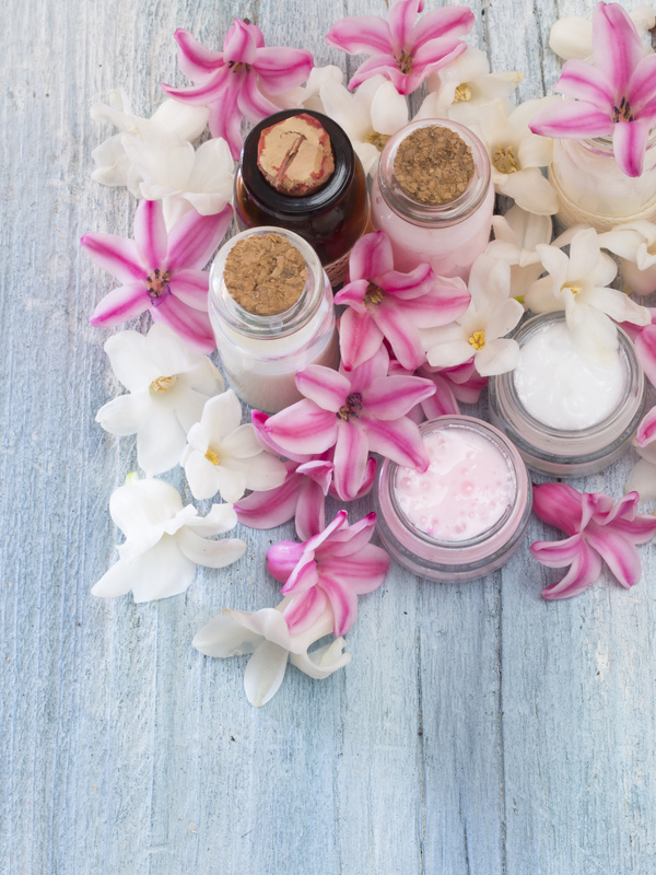 Essential oils and petals on the desktop Stock Photo 03
