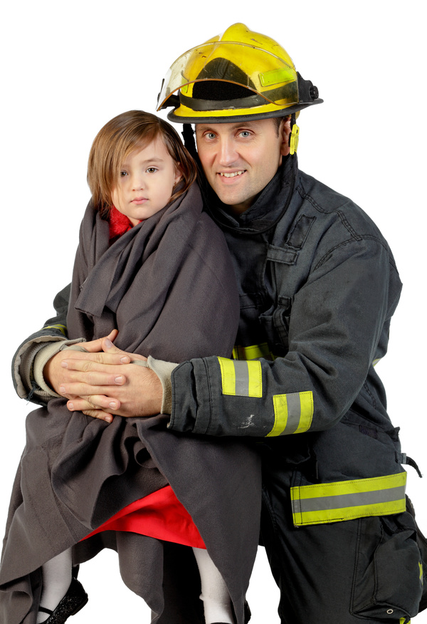 Firefighters and little girls Stock Photo
