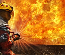 Firefighters extinguishing Stock Photo