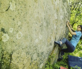 Free climbing woman Stock Photo
