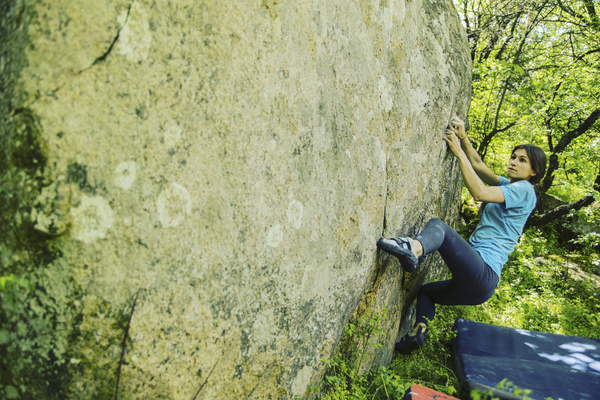 Free climbing woman Stock Photo