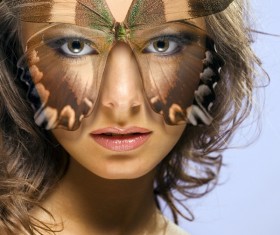 Girl with butterfly mask Stock Photo