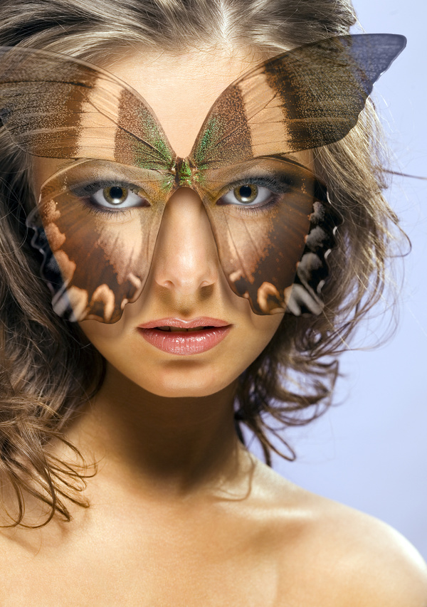 Girl with butterfly mask Stock Photo